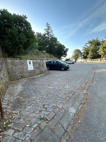a car parked on the side of a road at Tana del Cinghiale in Tirli