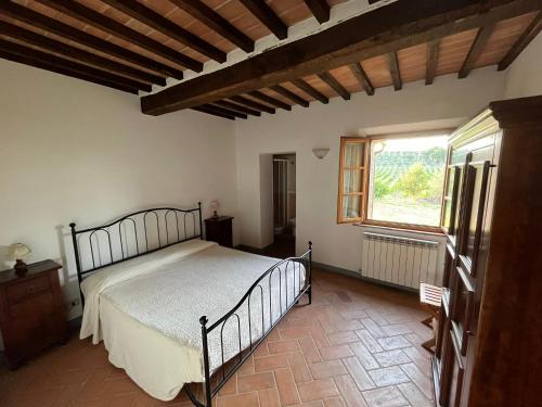 Katil atau katil-katil dalam bilik di Podere Casa Andrei