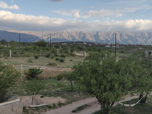 a view of a desert with mountains in the background at Cabaña 2 habitaciones in Arroyo de Los Patos