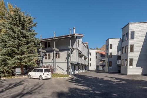 a white car parked in front of a building at Habitat Condo A7 in Ketchum