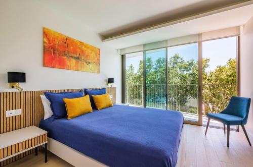 Ένα ή περισσότερα κρεβάτια σε δωμάτιο στο Portugal Portfolio - Legacy Apartment