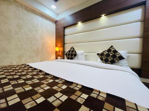 Un ou plusieurs lits dans un hébergement de l'établissement Hotel Kc Inn Ajmer