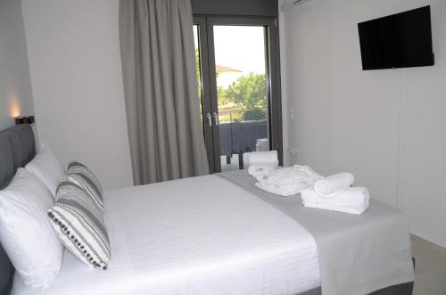 Katil atau katil-katil dalam bilik di Avanto Apartments Lefkas Awaits