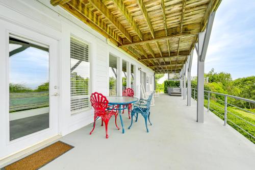 a porch with three chairs and a table on it at Near Hiking Trails Luxe Canton Getaway with Grill in Canton