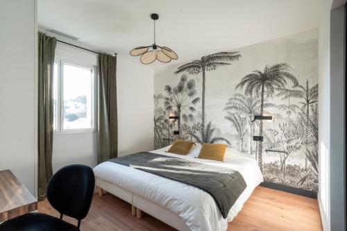 Postel nebo postele na pokoji v ubytování L'écho des Vagues