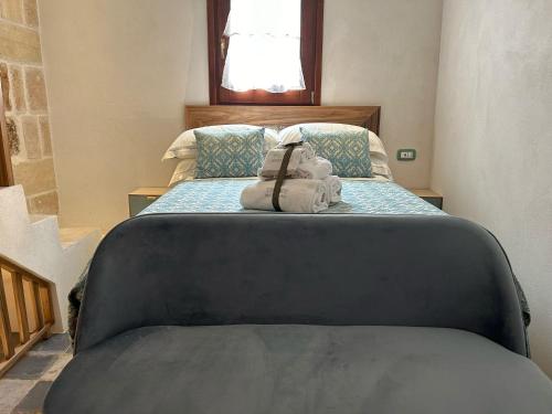 Кровать или кровати в номере Trame Poesia di mare 2