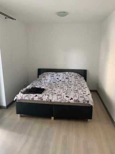 Ένα ή περισσότερα κρεβάτια σε δωμάτιο στο Apartmány Plzeň Nejlepší ceny Plzeň