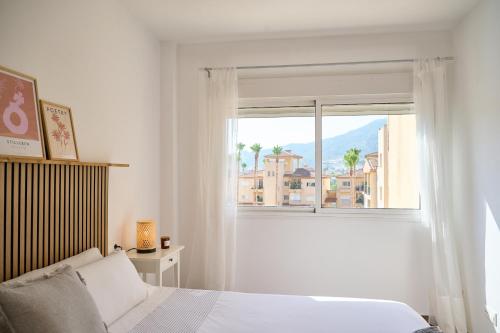Postel nebo postele na pokoji v ubytování Apartment Albir Playa Paradise