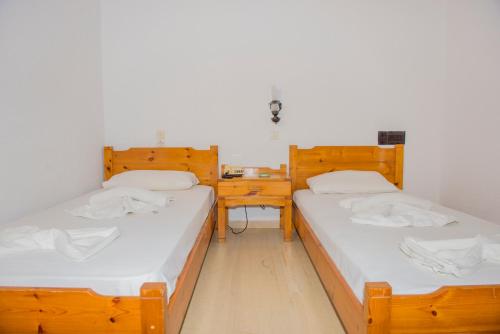 Katil atau katil-katil dalam bilik di Hotel Velissarios