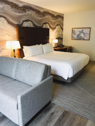 Ein Bett oder Betten in einem Zimmer der Unterkunft Sitzmark Vail