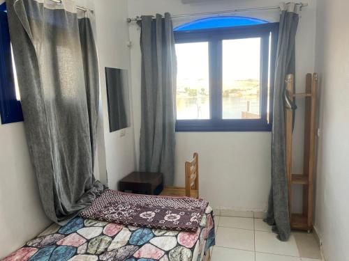 Seko Kato Nile View Hostelにあるベッド