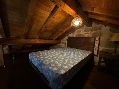 Postel nebo postele na pokoji v ubytování CASA Guimarás 2