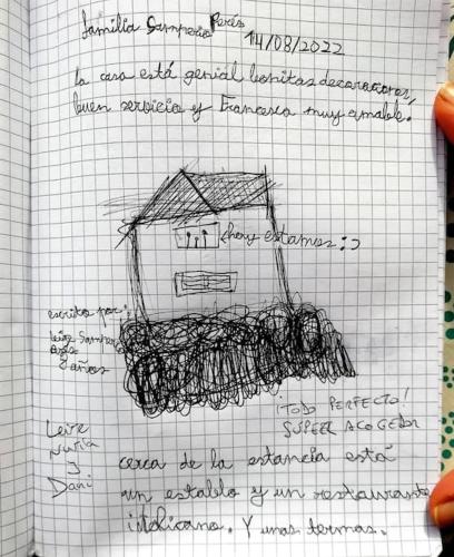 a drawing on a sheet of paper with handwriting at Le Casine di Tuscany Maremma Saturnia in Catabbio