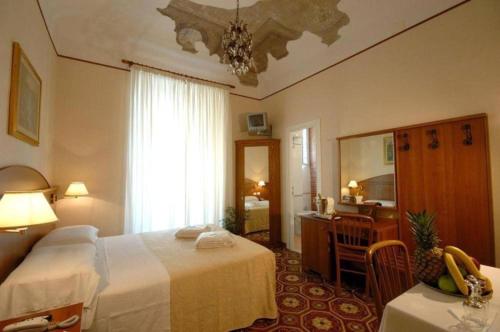 Postel nebo postele na pokoji v ubytování NAHID ACCOMMODATION