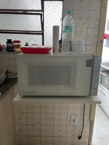 Kuchyň nebo kuchyňský kout v ubytování Quarto rosa em frente moradia unicamp
