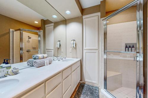 a bathroom with a sink and a shower at Southern Hills Charm Permit# 65256 in La Quinta