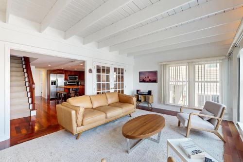 a living room with a couch and a table at Town of Lewes --- 119 Front St. in Lewes