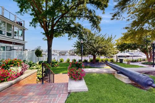 a view of a park with flowers and a cannon at Town of Lewes --- 119 Front St. in Lewes