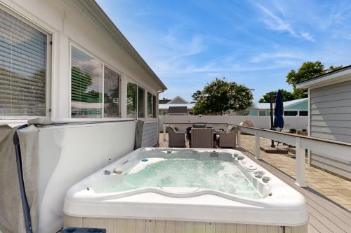 a jacuzzi tub on the deck of a house at Rehoboth Beach --- 37484 Washington Street in Rehoboth Beach