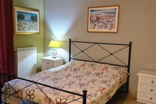 Ένα ή περισσότερα κρεβάτια σε δωμάτιο στο Suite Sardinia -Appartamento indipendente a Tanaunella