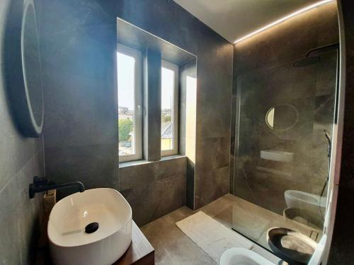 Bilik mandi di Jadabell 1 & 2 with sea view