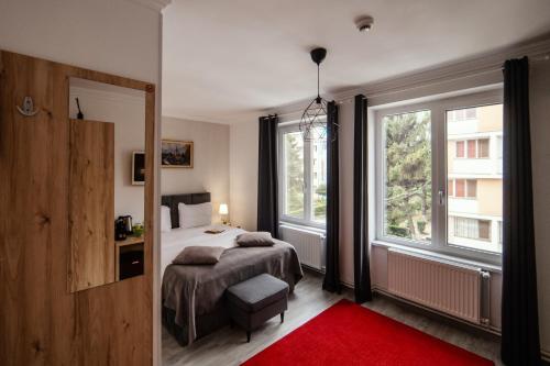 Postel nebo postele na pokoji v ubytování COMPLEX LIVING
