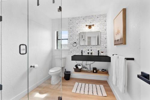 a bathroom with a sink and a toilet at Sage House Modern Retreat 3 Kings, Theater, Gmrm! in Sedona