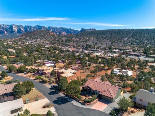 an aerial view of a small town with mountains at Sage House Modern Retreat 3 Kings, Theater, Gmrm! in Sedona