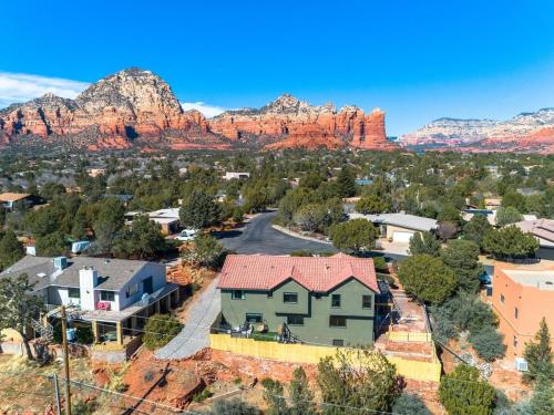 an aerial view of a small town with red rocks at Sage House Modern Retreat 3 Kings, Theater, Gmrm! in Sedona