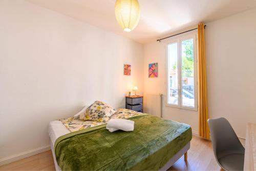 Katil atau katil-katil dalam bilik di Le Chevreul appartement entier proche Paris