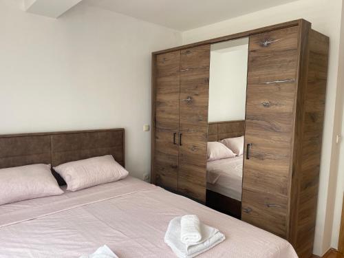 Ένα ή περισσότερα κρεβάτια σε δωμάτιο στο Apartman Ady 2