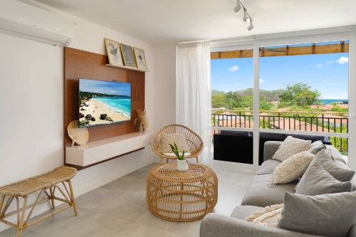 Posezení v ubytování Elegant & Cozy 2BR Condo G32 at Playa Venao