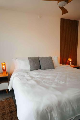 Postel nebo postele na pokoji v ubytování Elegant & Cozy 2BR Condo G32 at Playa Venao
