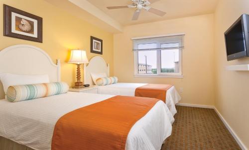 Postel nebo postele na pokoji v ubytování WorldMark Long Beach