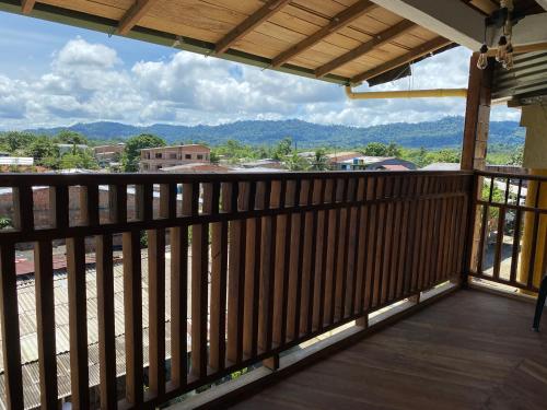 a balcony with a view of the mountains at Petra Hotel in Nuquí