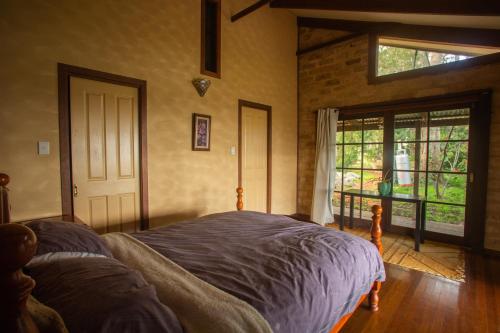 Ένα ή περισσότερα κρεβάτια σε δωμάτιο στο Stone Cottage