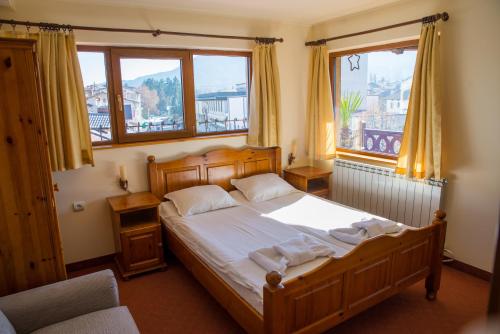 Säng eller sängar i ett rum på Pri Ani Guest House