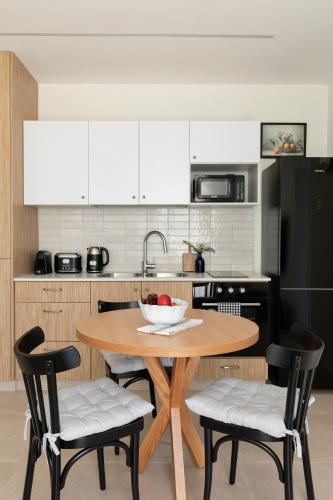 Kuchyň nebo kuchyňský kout v ubytování The J Luxury Apartments - By Localz Group