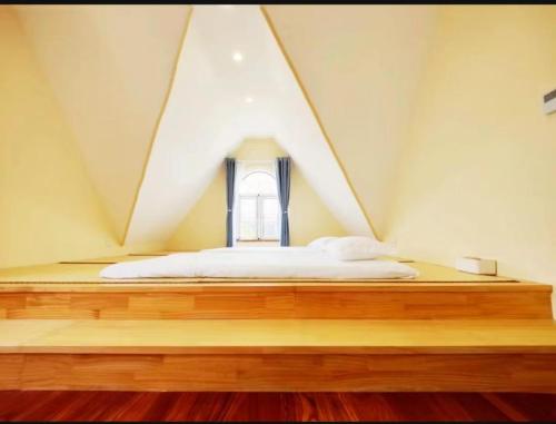 Ein Bett oder Betten in einem Zimmer der Unterkunft Shushe Hotel Shanghai