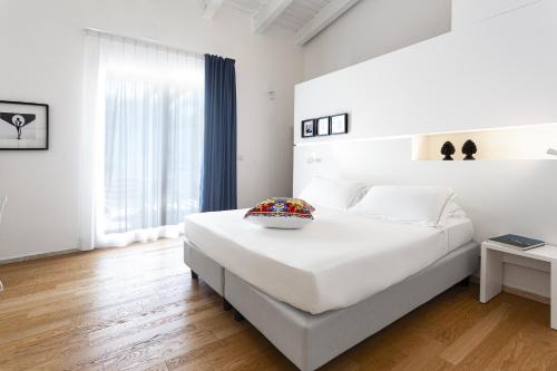 Postel nebo postele na pokoji v ubytování Calapetra Resort