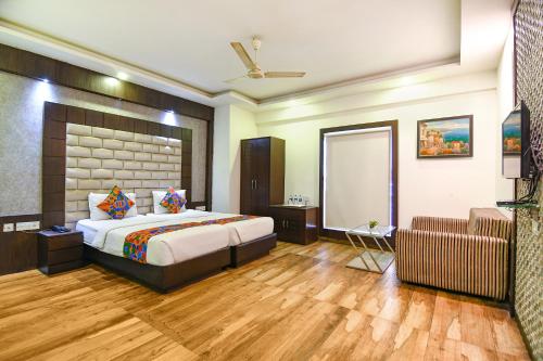 Postel nebo postele na pokoji v ubytování FabHotel Prime Goodwill