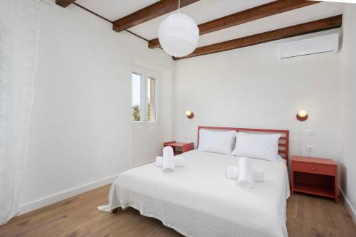 Ένα ή περισσότερα κρεβάτια σε δωμάτιο στο Casa Jinjola