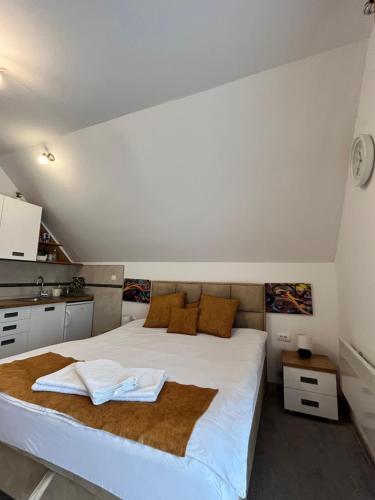 Postel nebo postele na pokoji v ubytování Apartman Pavle