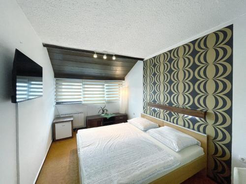 Postel nebo postele na pokoji v ubytování Reich Motel