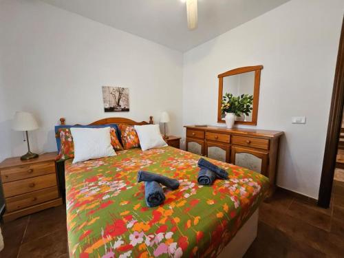 Letto o letti in una camera di La Casita de Las Lomas