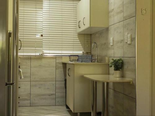 Η κουζίνα ή μικρή κουζίνα στο Beach House 22 - Manzini Chalets