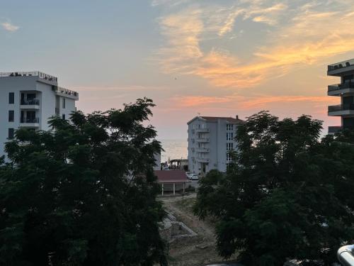 a view of a city with buildings and trees at SunSide Apartment Naila - Dobra Voda in Dobra Voda