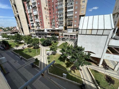 an aerial view of a city with tall buildings at Kikz Apartment in Pristina