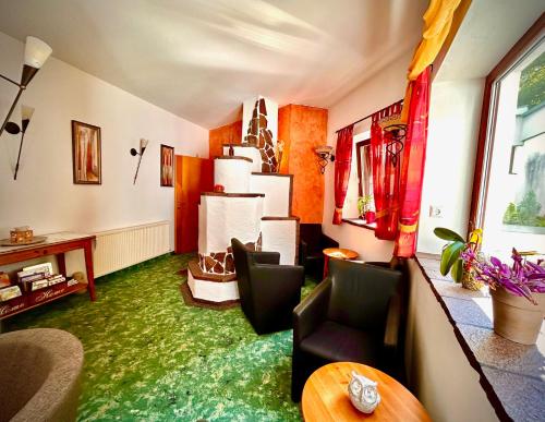 Posezení v ubytování Das WALDFRIEDE Appartement