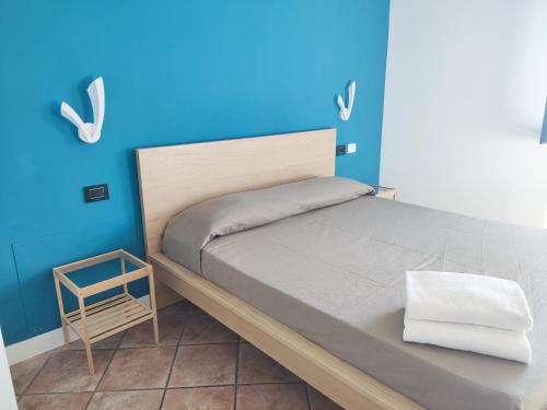 Postel nebo postele na pokoji v ubytování Ristorante Albergo Dante